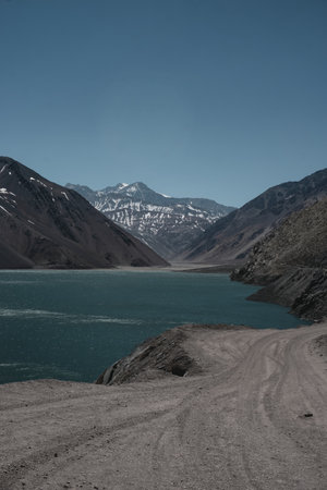 Impressive vertical photo of the Embalse El Yeso, located in San Jose de Maipo known as El Cajon del...
