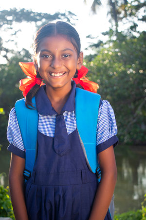Smiling indian Rural School Girl Looking at cameraの写真素材