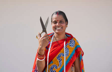 PORTRAIT OF A RURAL WOMAN Holding Scissorsの写真素材