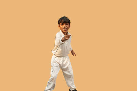 A boy celebration taking a catch During a Cricket Gameの写真素材