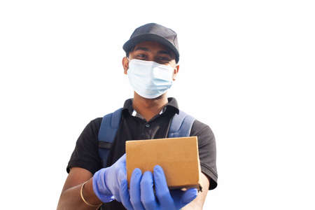 Portrait of confident delivery man giving package