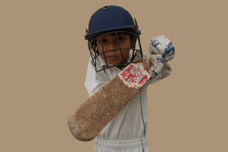 Portrait of boy Playing cricket