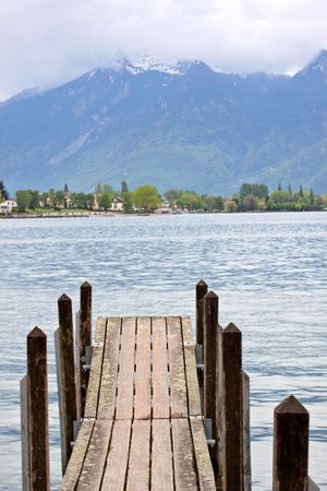 Planked footway on mountain lake in Swissの写真素材