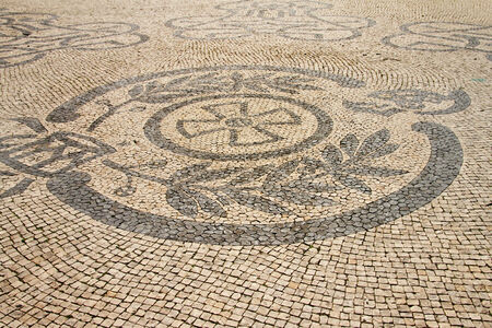 Traditional marble mosaic on street in Lisbon  Portugal  の写真素材