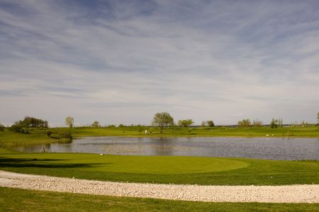 Beautifull view of the golf course and lakeの写真素材