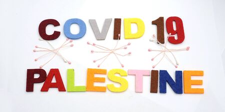 CONCEPT COVID-19 PENDAMIC  COVID-19  Palestine. Colourful felt Text .の写真素材