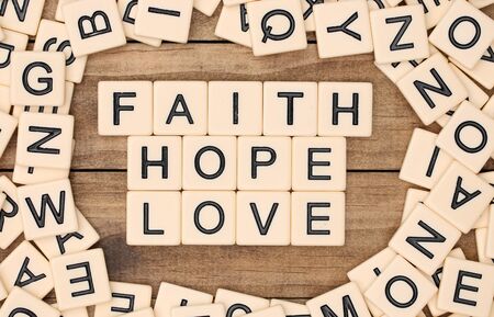 Faith, Hope and Love spelled out in block lettersの写真素材
