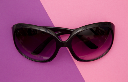 Ladies Sun Shades on a Duel Colored Modern Backgroundの写真素材