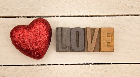 Valentines Themed Background on a Wooden Tableの写真素材