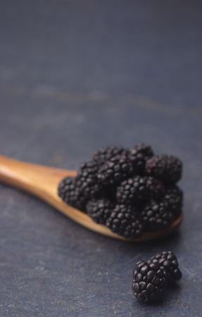 Fresh Plump Blackberries on a Slate Countertopの写真素材