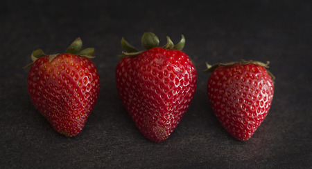 Strawberries on a Slate Counterの写真素材