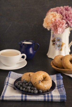 Blueberry Cake Donuts on a Slate Counterの写真素材
