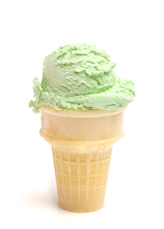 Green Ice Cream in a Sugar Coneの写真素材