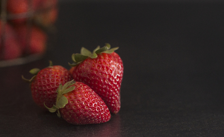 Strawberries on a Slate Counterの写真素材