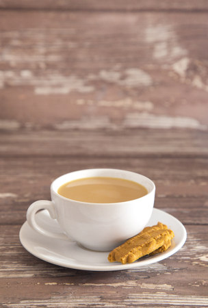 Cup of Tea on a Distressed Wood Tableの写真素材