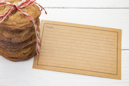 Stack of Homemade Chocolate Chip cookies and a Recipe Card to Add Your Own Recipeの写真素材