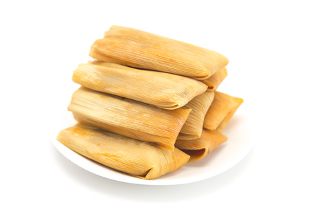 Homemade Wrapped Tamales Isolated on a White Backgroundの写真素材