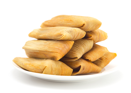 Homemade Wrapped Tamales Isolated on a White Backgroundの写真素材