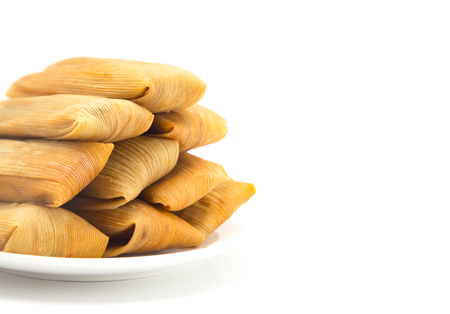 Homemade Wrapped Tamales Isolated on a White Backgroundの写真素材