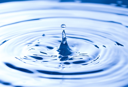SImple Water Droplets into a Pool of Waterの写真素材