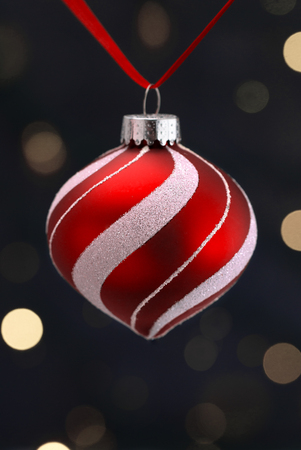 Hanging Christmas Ornament with a Black Backgroundの写真素材