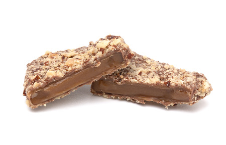 Luxery Chocolate Covered English Toffee Coated in Nuts on a White Backgroundの写真素材