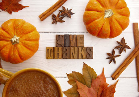 A Thanksgiving Themed Background with Read Fall Leavesの写真素材