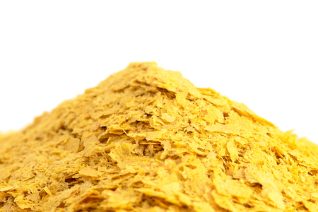 Flakes of Yellow Nutritional Yeast a Cheese Substitute and Seasoning for Vegan Cooking