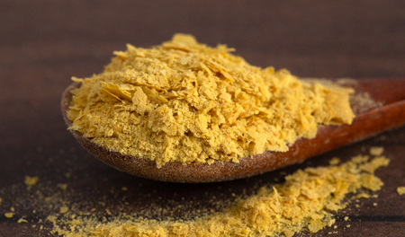 Flakes of Yellow Nutritional Yeast a Cheese Substitute and Seasoning for Vegan Cookingの写真素材