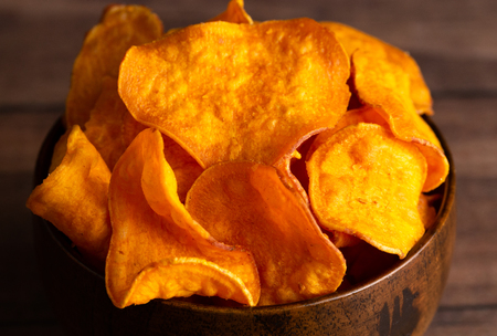 Healthy Potato Chips Made with Sweet Potatoes an Alternative to Classic Chipsの写真素材