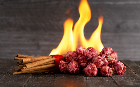 A Pile of Hot and Sweet Cinnamon Popcorn with Flames