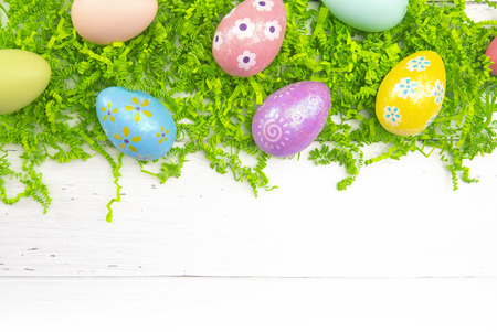 Easter Themed Background on a White Wooden Table