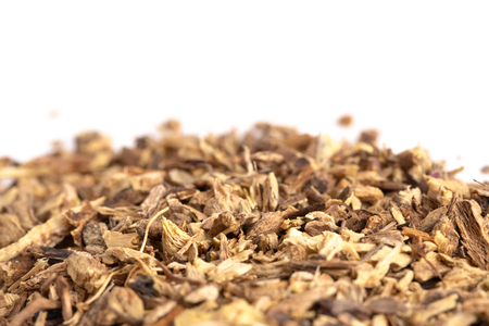 Dried Echinacea Root in a Pile on a White Backgroundの写真素材