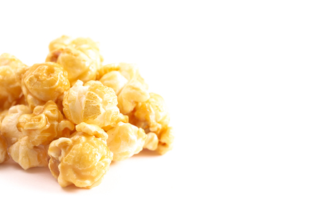 Lightly Carameled Popcorn Isolated on a White Backgroundの写真素材