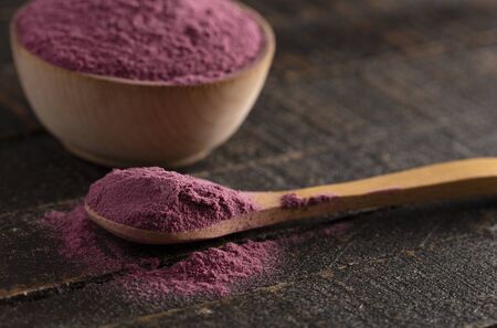 Bright Colored Acai Berry Powder Perfect for Adding to Recipes like Smoothiesの写真素材