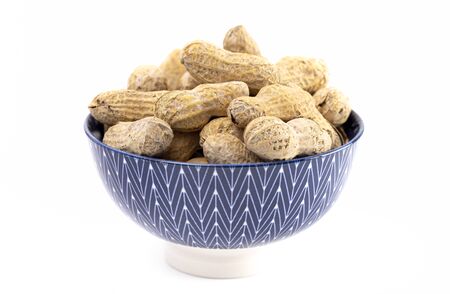 Raw In Shell Peanuts Isolated on a White Background