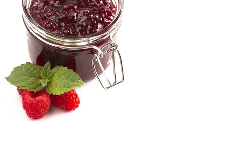 A Jar of Homemade Raspberry Jam Isolated on a White Background