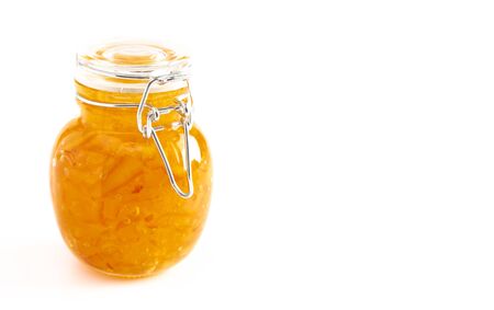 A Jar of Homemade Orange Marmalade Isolated on a White Backgroundの写真素材