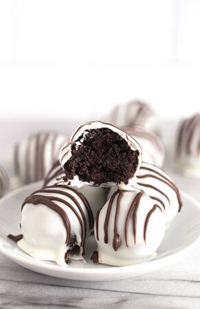 White Chocolate Covered Chocolate Sandwich Cookie Truffles