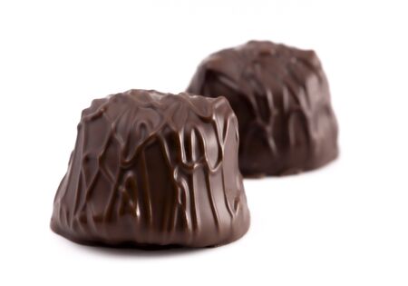 Two Dark Chocolate Truffles Isolated on a White Backgroundの写真素材