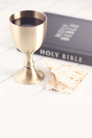 Holy Communion or the Lords Supper on a White Wooden Table