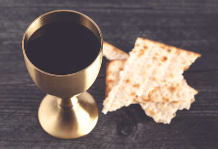 Holy Communion or the Lords Supper on a Black Wood Table