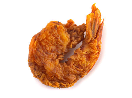 Breaded and Fried Jumbo Shrimp with Tails Isolated on a White Backgroundの写真素材