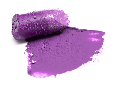 Cut tube lipstick isolated on whiteの写真素材