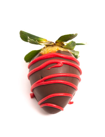 Chocolate Covered Strawberries with Red Drizzle Isolated on a White Backgroundの写真素材