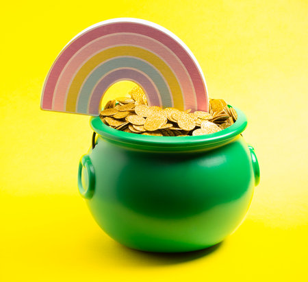 Green Pot Full of Golden Coins at the End of the Rainbowの写真素材