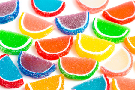 A Variety of Multicolored Candy Fruit Slice Isolated on a White Backgroundの写真素材