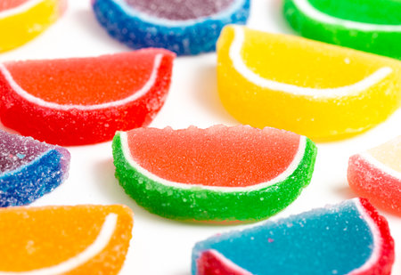 A Variety of Multicolored Candy Fruit Slice Isolated on a White Backgroundの写真素材