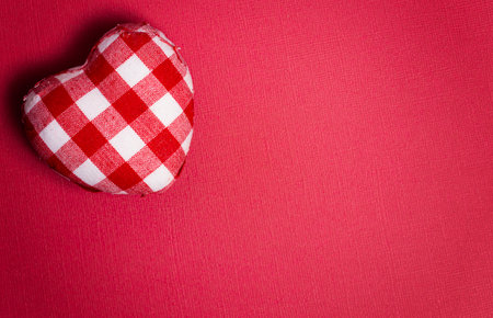 Plaid Love Hearts on a Red Backgroundの写真素材