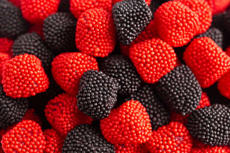 A Background of Raspberry and Blackberry Gummy Candies